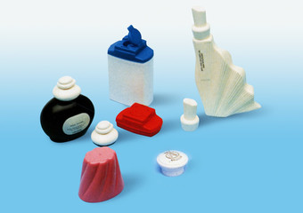 Multi-cavity molds for caps and containers in the cosmetics branch.
